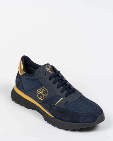 ZAPATILLA DEPORTIVA AZUL OSCURO CON ELEMENTOS DE ORO