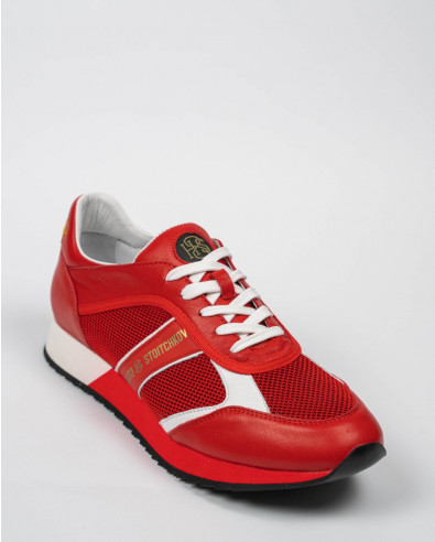 RED RUNNING-STYLE TRAINERS IN MIXED MATERIALS WITH RAISED LOGO