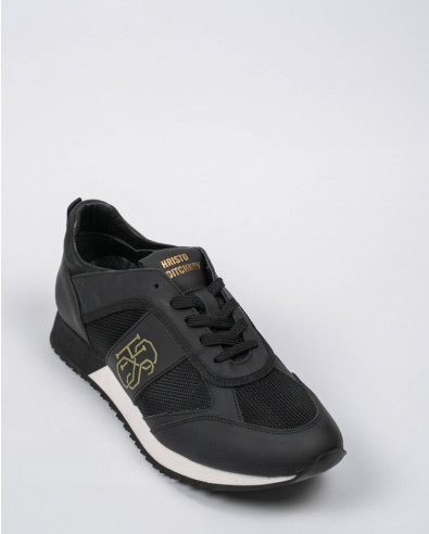 BLACK RUNNING-STYLE TRAINERS IN MIXED MATERIALS AND RUBBER EFFECT 